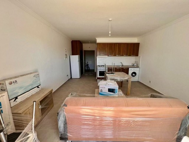 NEUE STUDIOWOHNUNG ZUM VERKAUF IN İSKELE LONG BEACH, NUR FUß ZUM MEER