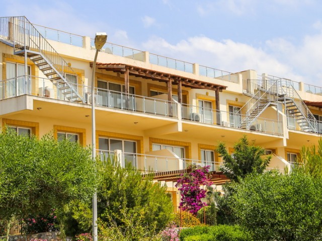 2-Bedroom + landscaped garden + beachfront + pool + gym + 1kat apartment for sale in Tatlısu ** 