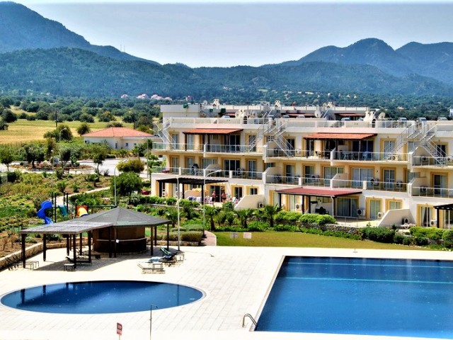 2-Bedroom + landscaped garden + beachfront + pool + gym + 1kat apartment for sale in Tatlısu ** 