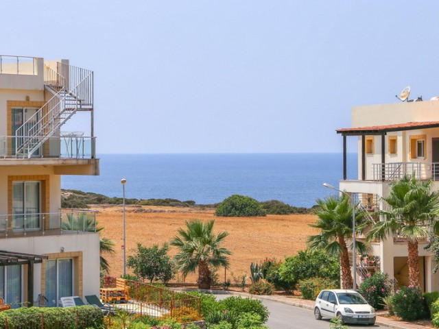 2-Bedroom + landscaped garden + beachfront + pool + gym + 1kat apartment for sale in Tatlısu ** 