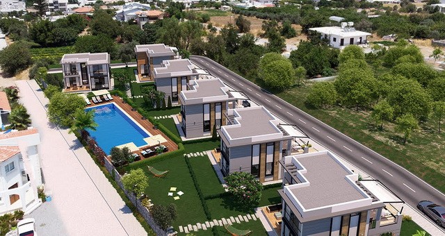 Villas for sale in Alsancak with 3 bedrooms + shared swimming pool + built with high quality materials + modern design + payment plan ** 