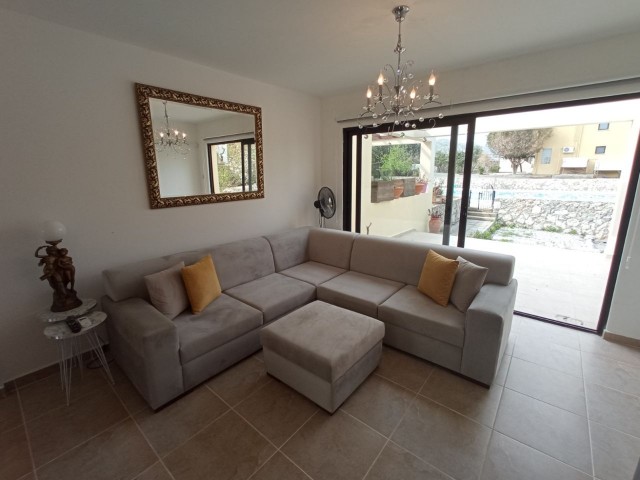 Tastefully Furnished and Well Maintained - 2 + 1 Garden Apartment with Shared Pool