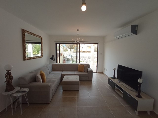 Tastefully Furnished and Well Maintained - 2 + 1 Garden Apartment with Shared Pool 