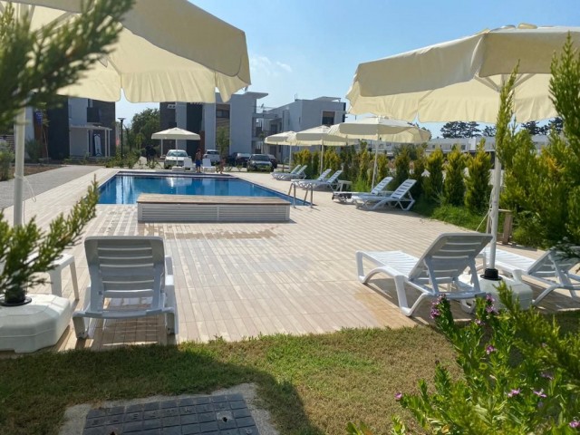 Newly Constructed 2 + 1 Penthouse with large roof terrace and shared pool in the heart of Ozankoy