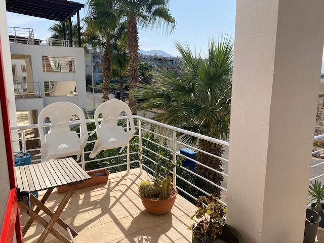 A lovely peaceful 2 bedroom apartment with shared pools and well maintained gardens with stunning views + Exchange title deeds in owners name