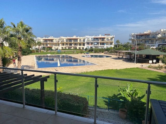 A lovely peaceful 2 bedroom apartment with shared pools and well maintained gardens with stunning views + Exchange title deeds in owners name
