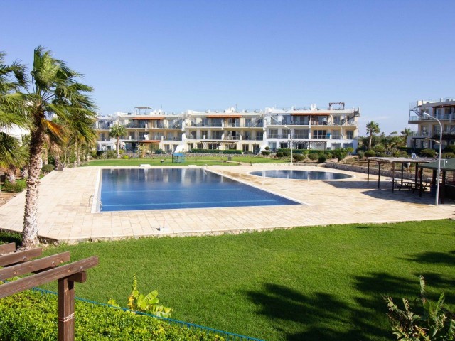 A lovely peaceful 2 bedroom apartment with shared pools and well maintained gardens with stunning views + Exchange title deeds in owners name