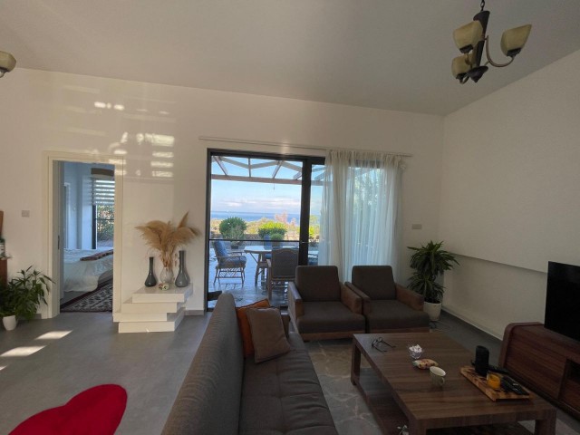 A 3 bedroom bungalow + roof terrace + communal pool + amazing sea views