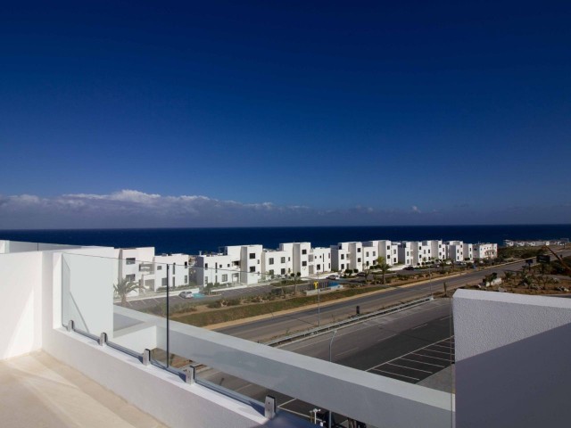 Brand new  2-bedroom  luxury resale  loft penthouse only 150 meters to the sea  +  large roof terrace +  communal swimming pool + beach in walking  distance + future yachting marina