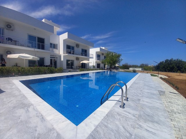 Luxury brand new 2 bedroom ground floor apartment in a small development - communal pool and garden 