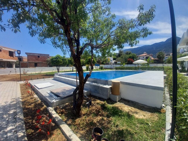 Luxury brand new 2 bedroom ground floor apartment in a small development - communal pool and garden 