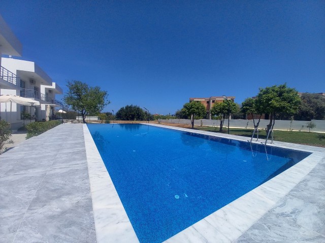 Luxury brand new 2 bedroom ground floor apartment in a small development - communal pool and garden 