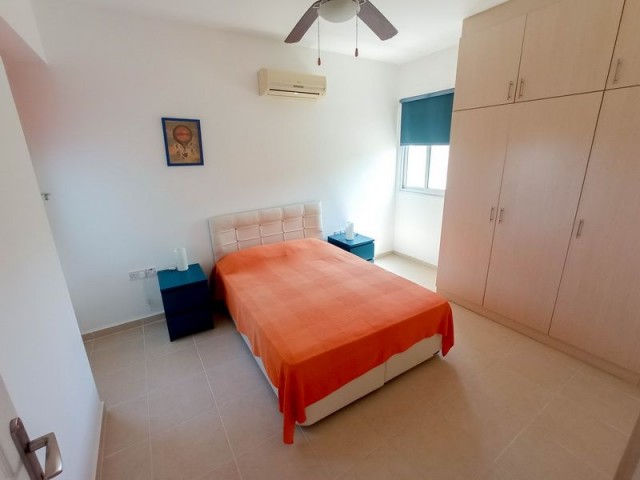 2 bedroom garden resale apartment + fully furnished + communal pools + gated security + Title deed in the owner’s name, VAT paid