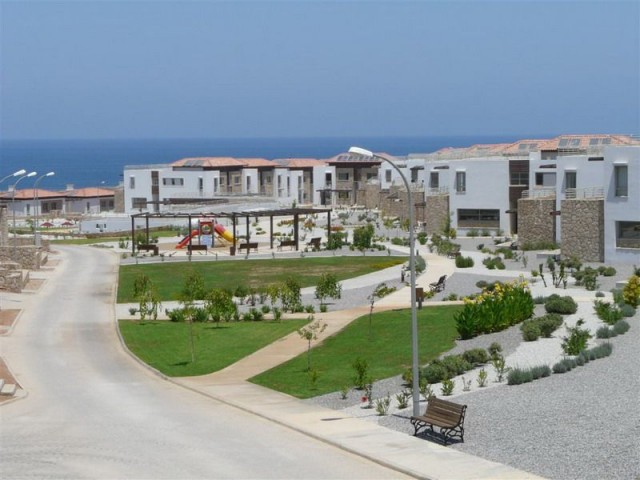 3 bedroom garden apartment + fully furnished + direct sea views + 4 communal swimming pools & sauna + Title deed in the owner’s name, VAT paid