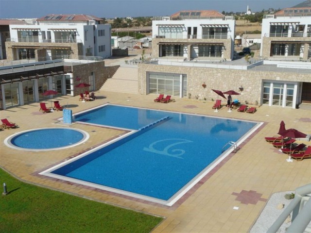 3 bedroom garden apartment + fully furnished + direct sea views + 4 communal swimming pools & sauna + Title deed in the owner’s name, VAT paid
