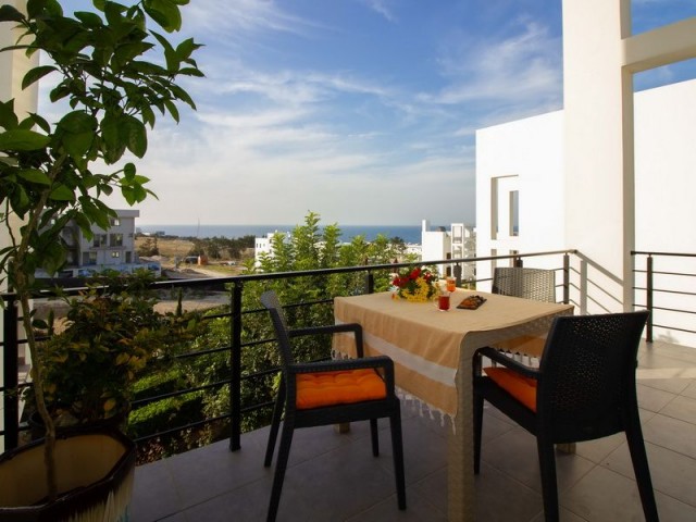 2-bedroom modern LOFT penthouse apartment + fully furnıshed + roof terrace + communal swimming pool + bar + walking distance to the beach and supermarket + sea and mountain views