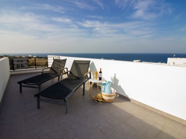 2-bedroom modern LOFT penthouse apartment + fully furnıshed + roof terrace + communal swimming pool + bar + walking distance to the beach and supermarket + sea and mountain views