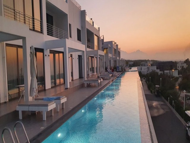 2 bed luxury penthouse apartment + private roof terrace + communal swimming pools + restaurant + SPA center + tennis court + golf