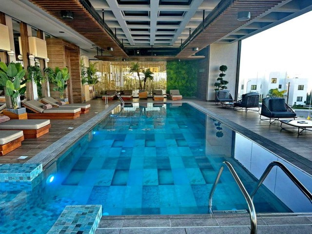 2 bed luxury penthouse apartment + private roof terrace + communal swimming pools + restaurant + SPA center + tennis court + golf