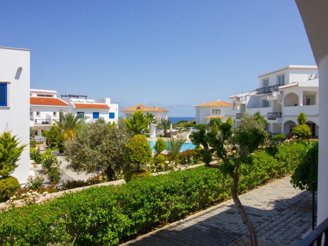 3 bedroom ground floor apartment + kitchen units + communal pool + private beach + all on site facilities