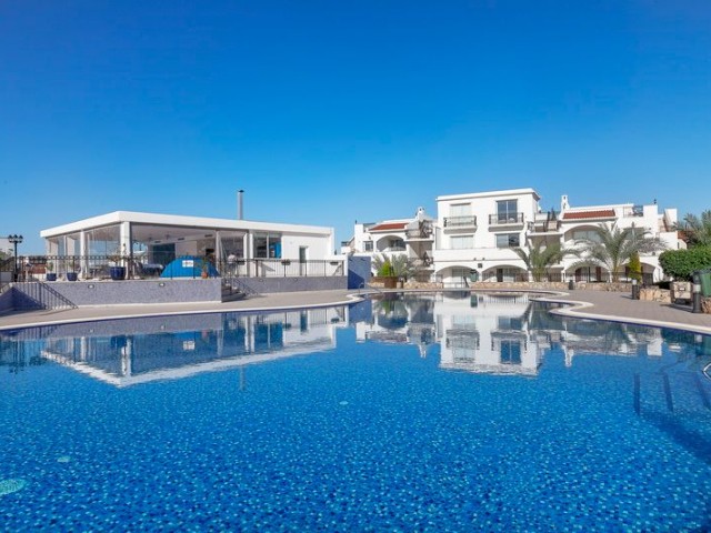 3 bedroom ground floor apartment + kitchen units + communal pool + private beach + all on site facilities