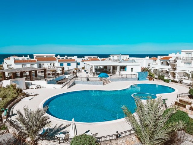 3 bedroom ground floor apartment + kitchen units + communal pool + private beach + all on site facilities