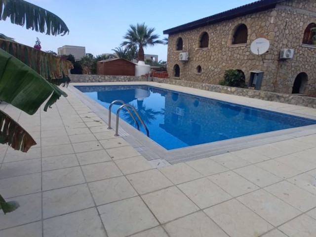 A modern 1 bedroom apartment on a small quiet well kept site + communal pool + mountain views