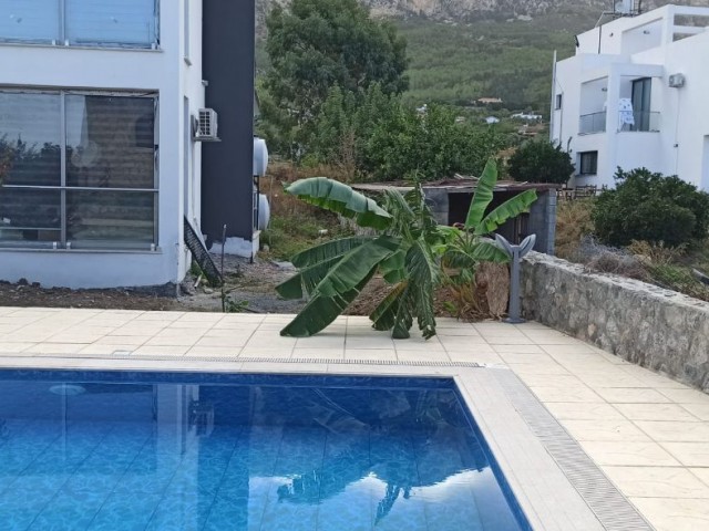 A modern 1 bedroom apartment on a small quiet well kept site + communal pool + mountain views