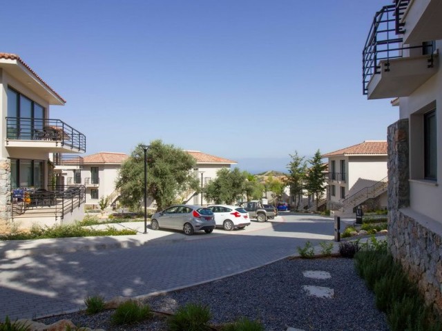 2 bedroom modern penthouse apartment + part of an award winning boutique hotel and wine farm + communal swimming pool + gym + cafe + sauna + children’s playground + beautiful sea and mountains views