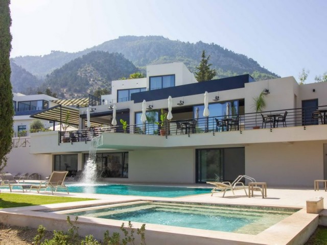 2 bedroom modern penthouse apartment + part of an award winning boutique hotel and wine farm + communal swimming pool + gym + cafe + sauna + children’s playground + beautiful sea and mountains views