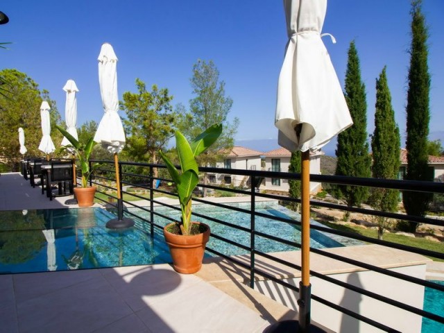 2 bedroom modern penthouse apartment + part of an award winning boutique hotel and wine farm + communal swimming pool + gym + cafe + sauna + children’s playground + beautiful sea and mountains views