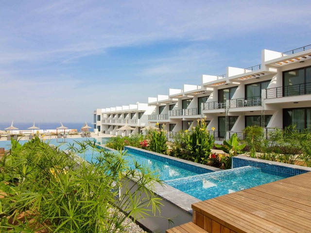 Modern resale studio ground apartment + sea side + communal pool + walking distance to the beach