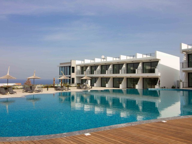 Modern resale studio ground apartment + sea side + communal pool + walking distance to the beach