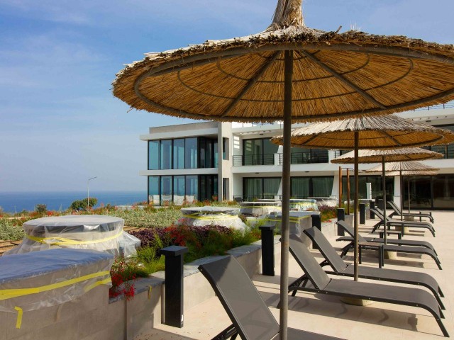Modern resale studio ground apartment + sea side + communal pool + walking distance to the beach