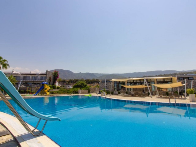 1 bedroom seaside garden apartment + communal swimming pool + within a complex + Sea and Mountains views + walking distance to the beach