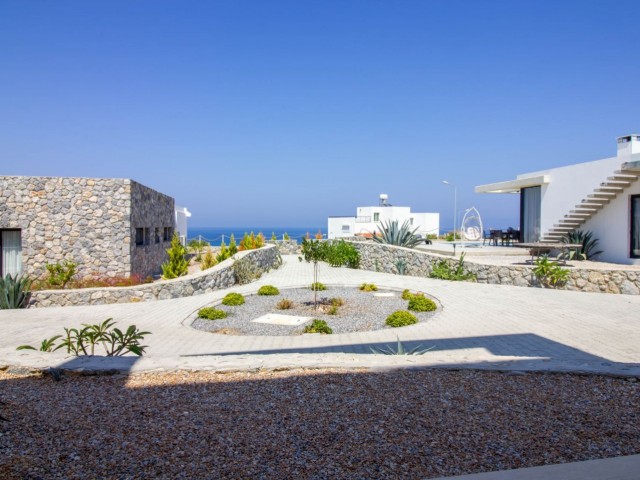 1 bedroom seaside garden apartment + communal swimming pool + within a complex + Sea and Mountains views + walking distance to the beach
