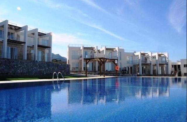 Deniz terra rezervinde + ortak havuz + bahçede uzun süreli kiralık 2 yatak odalı daire