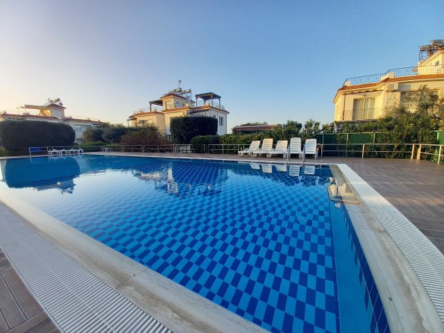 2 - bedroom penthouse in a quiet location in karsiyaka with roof terrace + gardens + communal pool  + close to amenities 