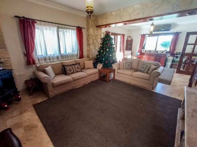 4 bedroom second hand villa + Roma End Swimming Pool + Large Plot Size + Central Heating + Garage. Title deed in the name of the seller - VAT paid and Pre-74 Turkish Title Deed