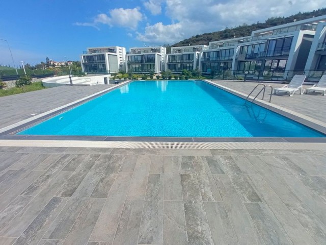 2-bedroom garden apartment + fully furnished + storage room + 3 communal swimming pools + amphitheater + close proximity to schools and the city centre of Kyrenia 