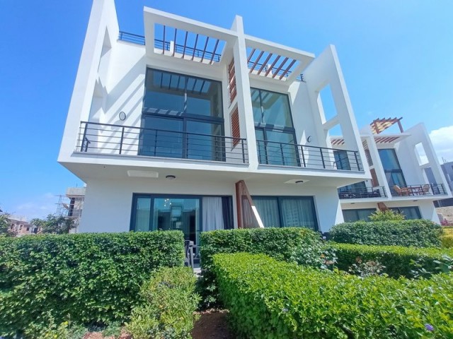 1-bedroom modern garden apartment + fully furnished + communal swimming pool + bar + walking distance to the beach and supermarket + sea and mountain views