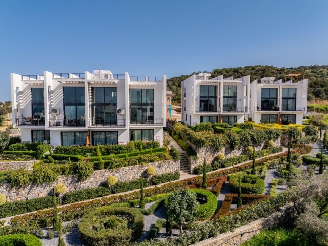 1-bedroom modern garden apartment + fully furnished + communal swimming pool + bar + walking distance to the beach and supermarket + sea and mountain views