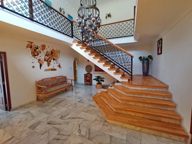 4-bedroom resale villa + 10m2 x 5m2 heated swimming pool + fully furnished + gym + snooker game room + wine cellar + storage room + double garage + bar near the pool + uninterrupted sea and mountain views + Pre-74 Turkish title deed in the owner’s name, VAT paid