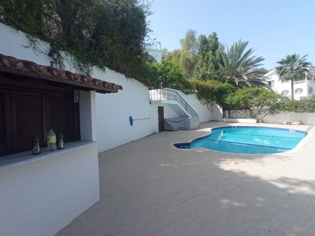 4-bedroom resale villa + 10m2 x 5m2 heated swimming pool + fully furnished + gym + snooker game room + wine cellar + storage room + double garage + bar near the pool + uninterrupted sea and mountain views + Pre-74 Turkish title deed in the owner’s name, VAT paid