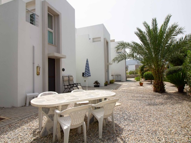 3 bedroom terrace house + fully furnished + 18m x 6m communal pool + air conditioning + kitchen appliances