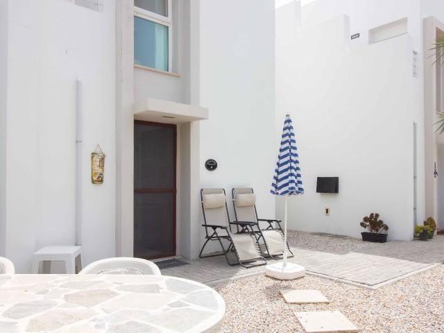 3 bedroom terrace house + fully furnished + 18m x 6m communal pool + air conditioning + kitchen appliances