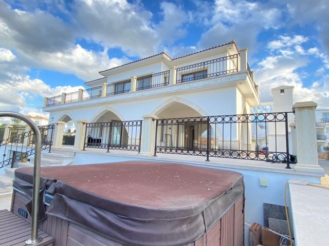 seafront villa for sale