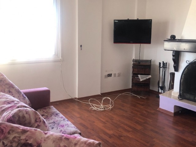 3 + 1 furnished apartment with fireplace for sale in Metehan district ** 