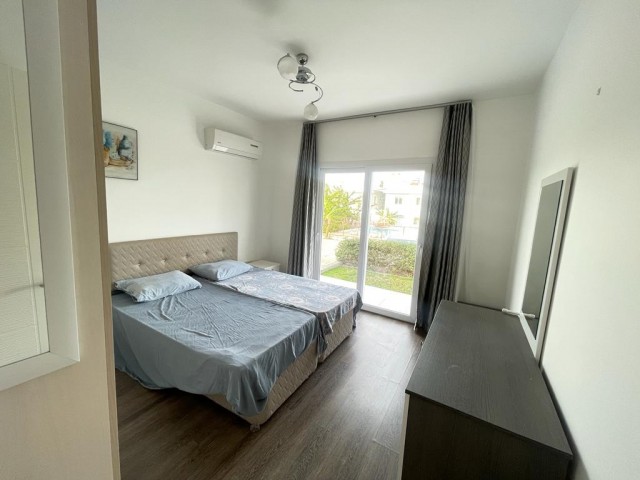 2+1 Wohnung zum Verkauf mit Garten und Pool in Karaoğlanoğlu