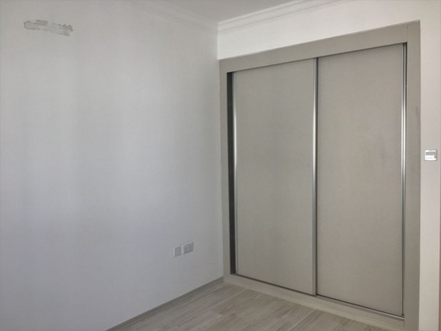 GİRNE MERKEZ DE 3+1 EŞYASIZ SATILIK 88.000 STG DAİRE